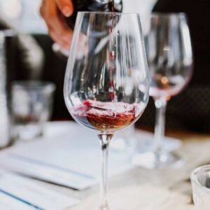 Group dining event featuring Greek seafood and wine at Manny’s Wine & Fish